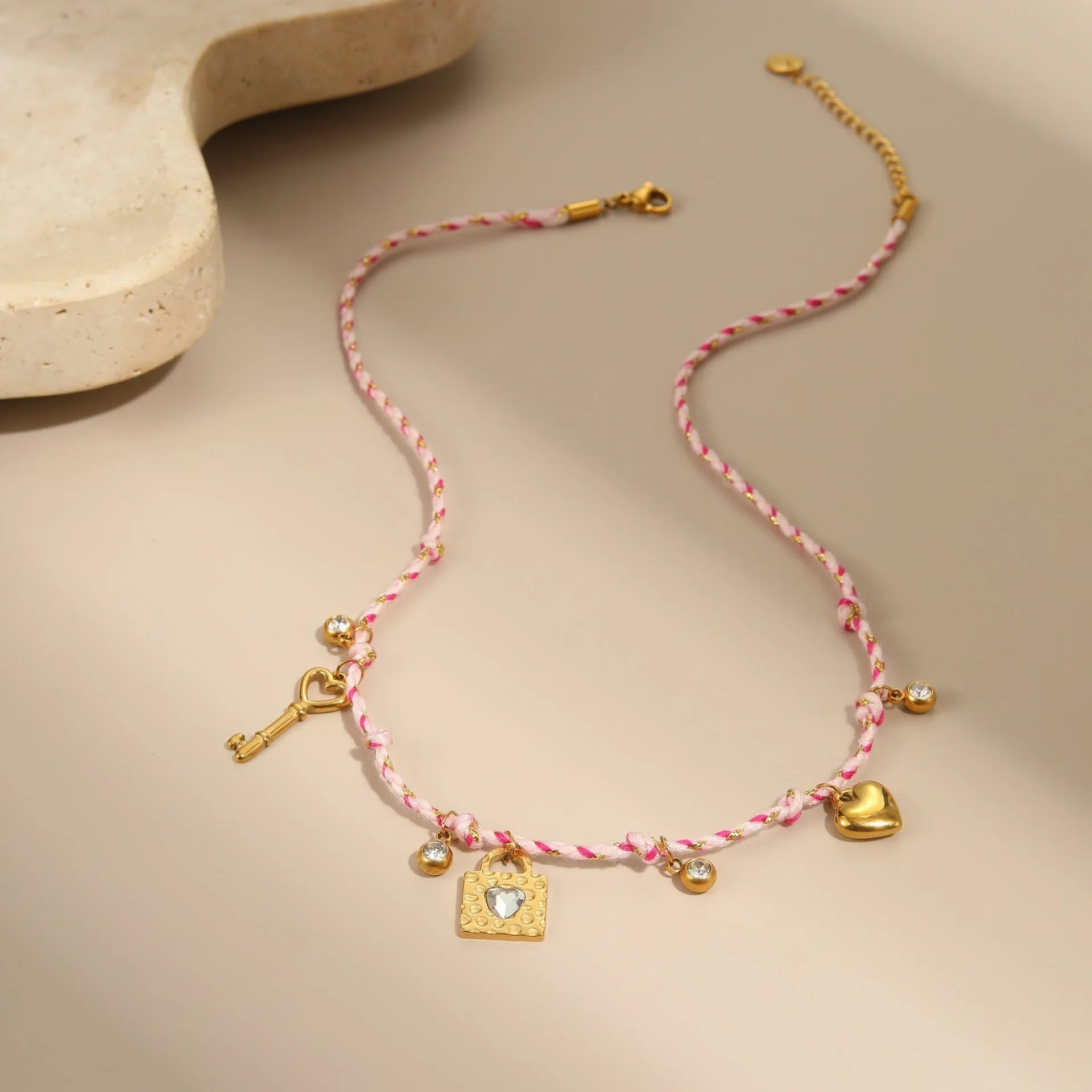 Titanium steel necklace with handmade colour braided rope and electroplated heart-shaped pendant
