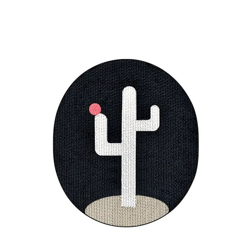 Wall mounted corrugated cardboard cat scratch pad with catnip in cactus design