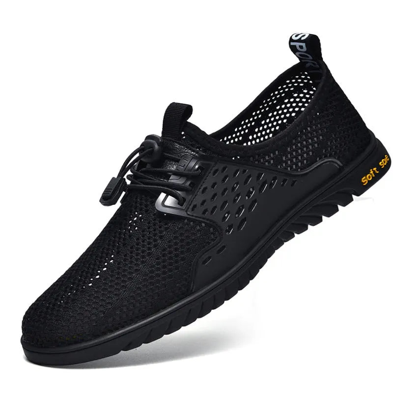 Men's black mesh casual shoes with elastic closure and round toe design