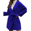 Minimalist loose fit long sleeve coat with lapel buttons and a split belt in a light blue colour.