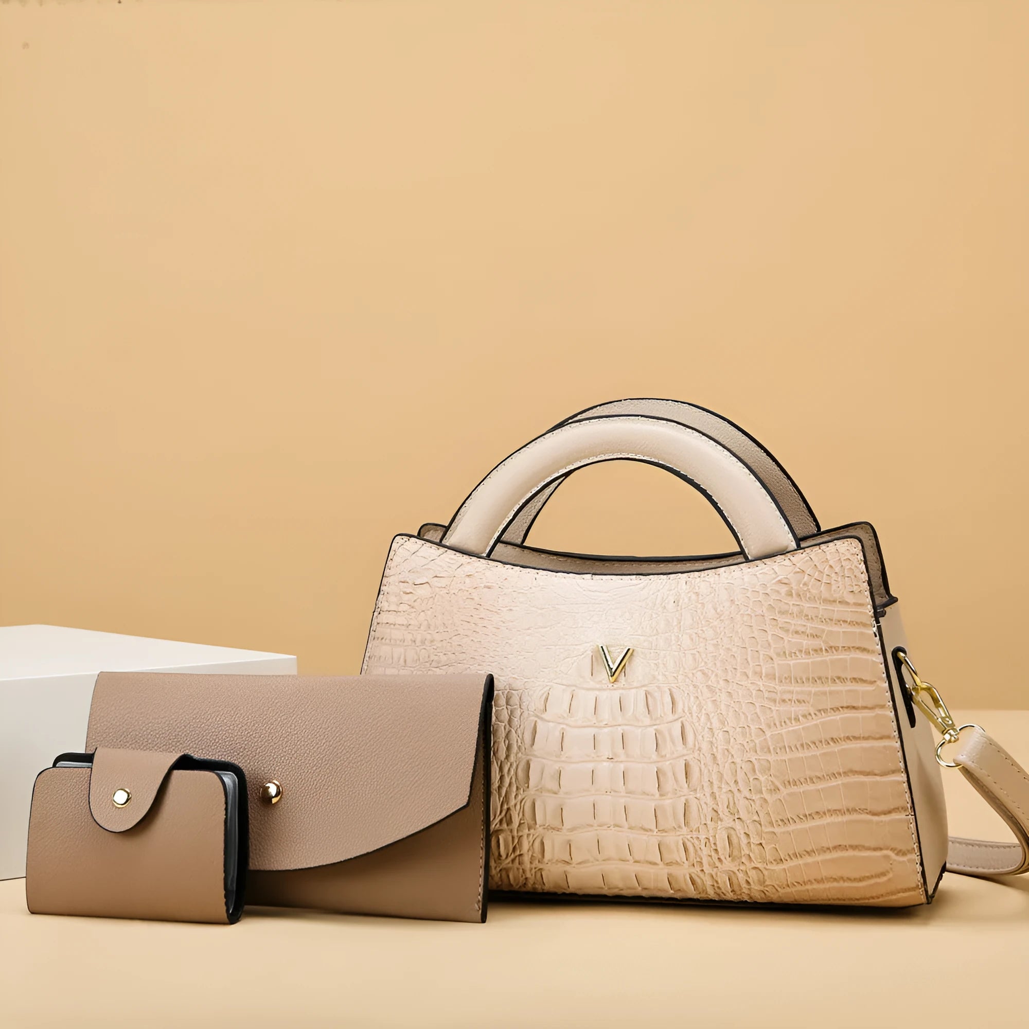 Women's black crocodile pattern PU leather crossbody handbag showing square shape and single shoulder strap.