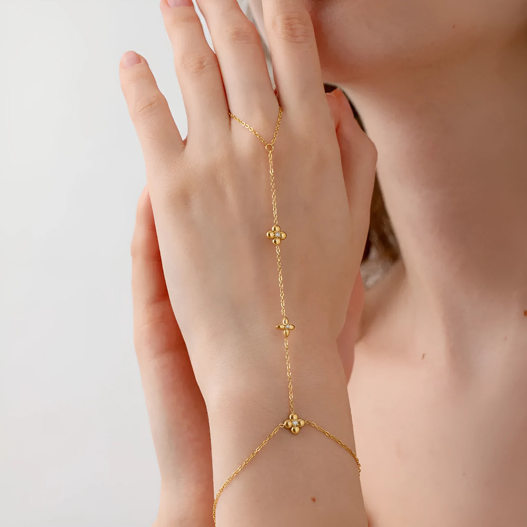 Women's stainless steel bracelet with geometric eight-pointed stars and floral design in NXB048 gold colour