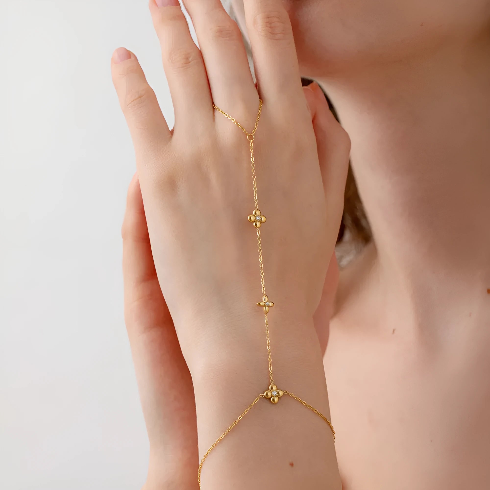 Women's stainless steel bracelet with geometric eight-pointed stars and floral design in NXB048 gold colour