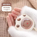 USB digital display hand warmer in pink, showing aluminium heating pad and screen