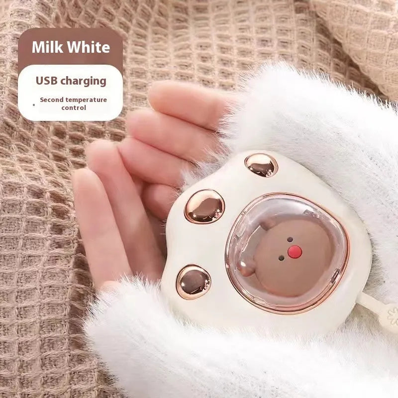 USB digital display hand warmer in pink, showing aluminium heating pad and screen