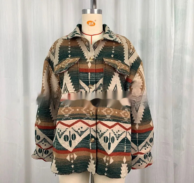 Women's loose-fit retro coat with blue Aztec print and long sleeves.