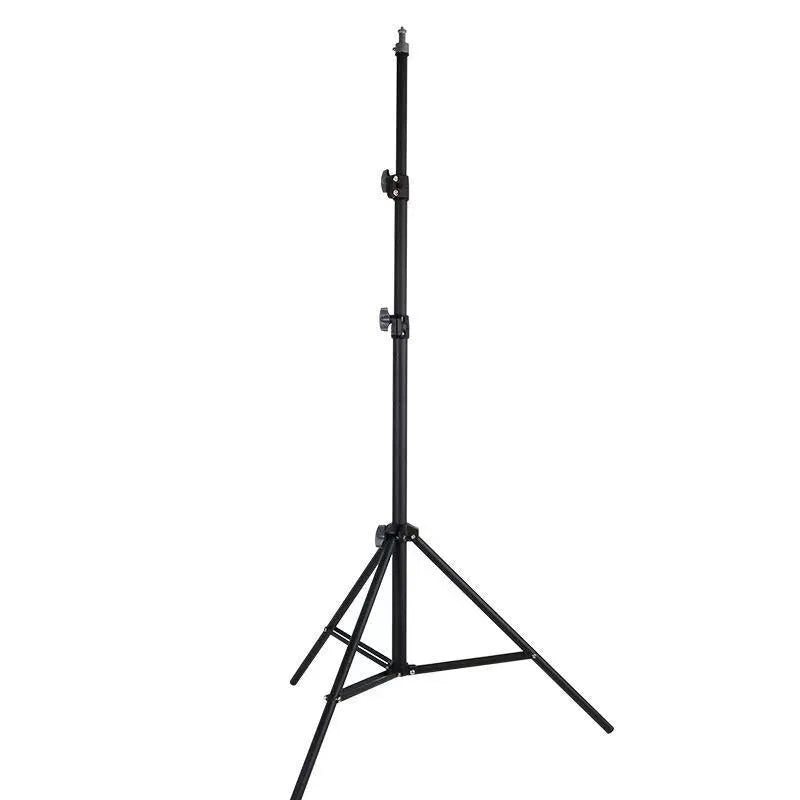 Tripod light stand with mobile phone holder showing adjustable height and frosted legs