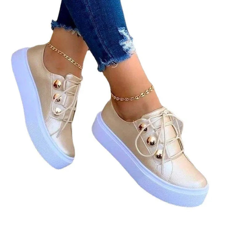 Women's white lace-up flats sneakers with rivet decoration and round toe design