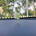 Plastic car swing decoration in choice of five colours measuring 5cm high