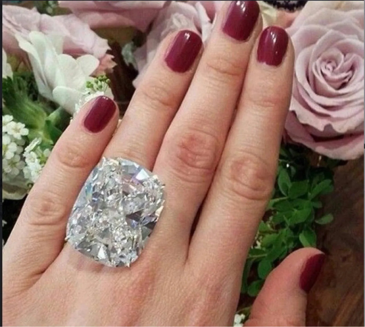 Simple geometric women's alloy ring with an inlaid white square diamond and a white gold colour finish.