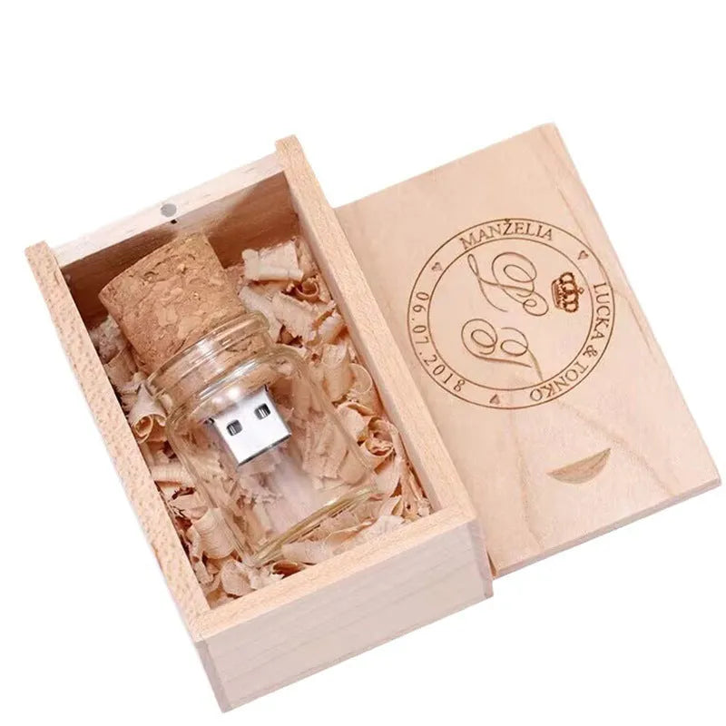 Clear glass drift bottle shaped USB flash drive with a wooden cork stopper, showing dimensions.