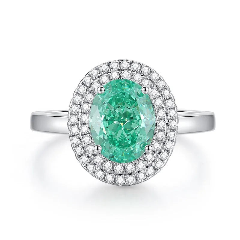 S925 silver emerald ring for women with inlaid high carbon diamonds in a geometric design on a white background.
