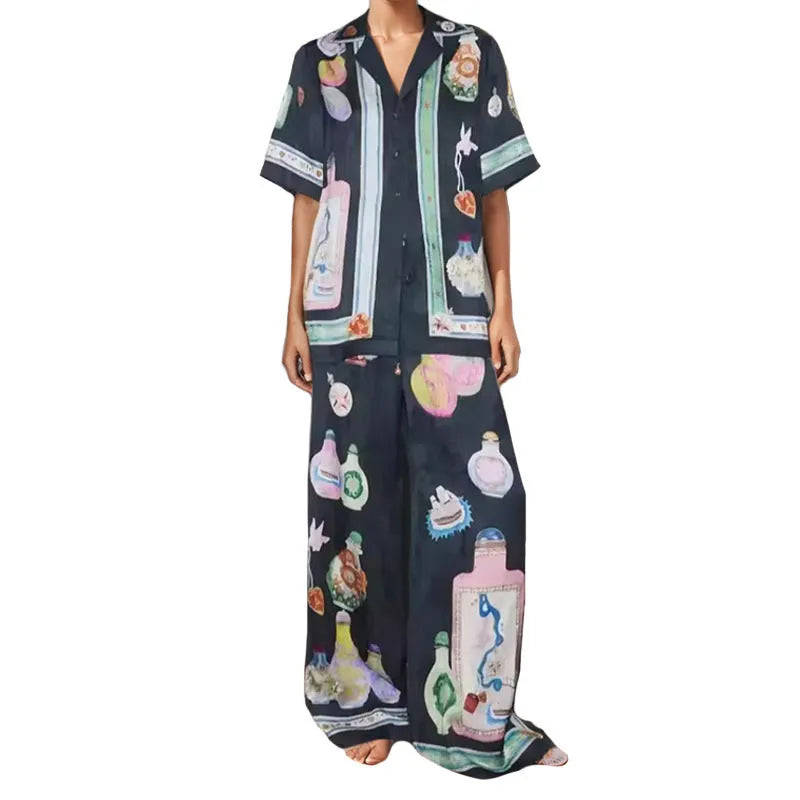 Black women's casual two-piece set with cartoon pattern cardigan and plain trousers