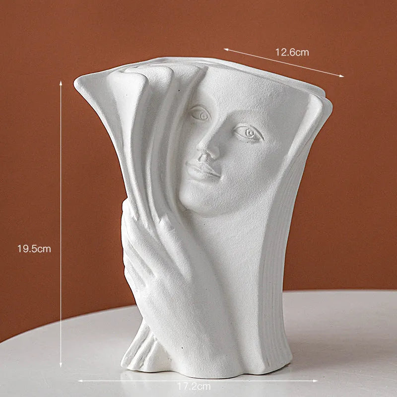 Glazed ceramic book stand sculpture in one of four modern styles: Lover, Dancer, Beauty and Beast, or Brushed Face.