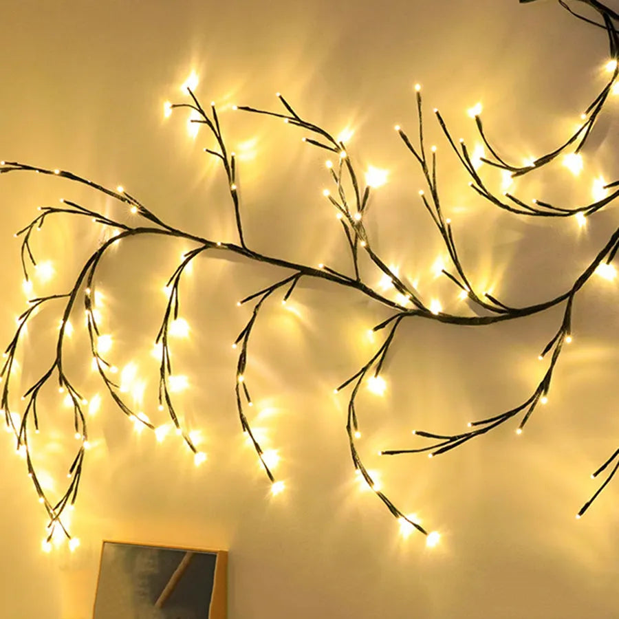 Flexible LED willow vine light garland with birch texture and 144 warm white lights on 2.3 metre branch