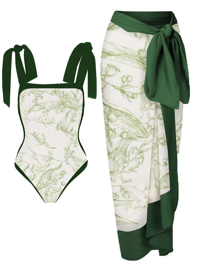 Women's printed chiffon two-piece swimsuit set with a separate hip skirt.