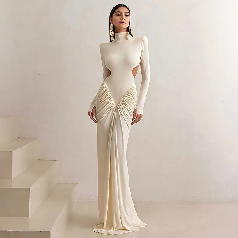Long sleeve high collar backless dress in slim fit with pleated detailing.