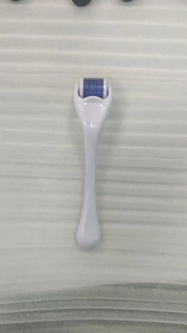 540 micro needle derma roller showing handle and wheel in different colour combinations with size specifications