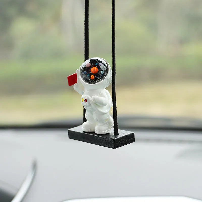 Resin car pendant with cartoon astronaut designs for vehicle interior decoration