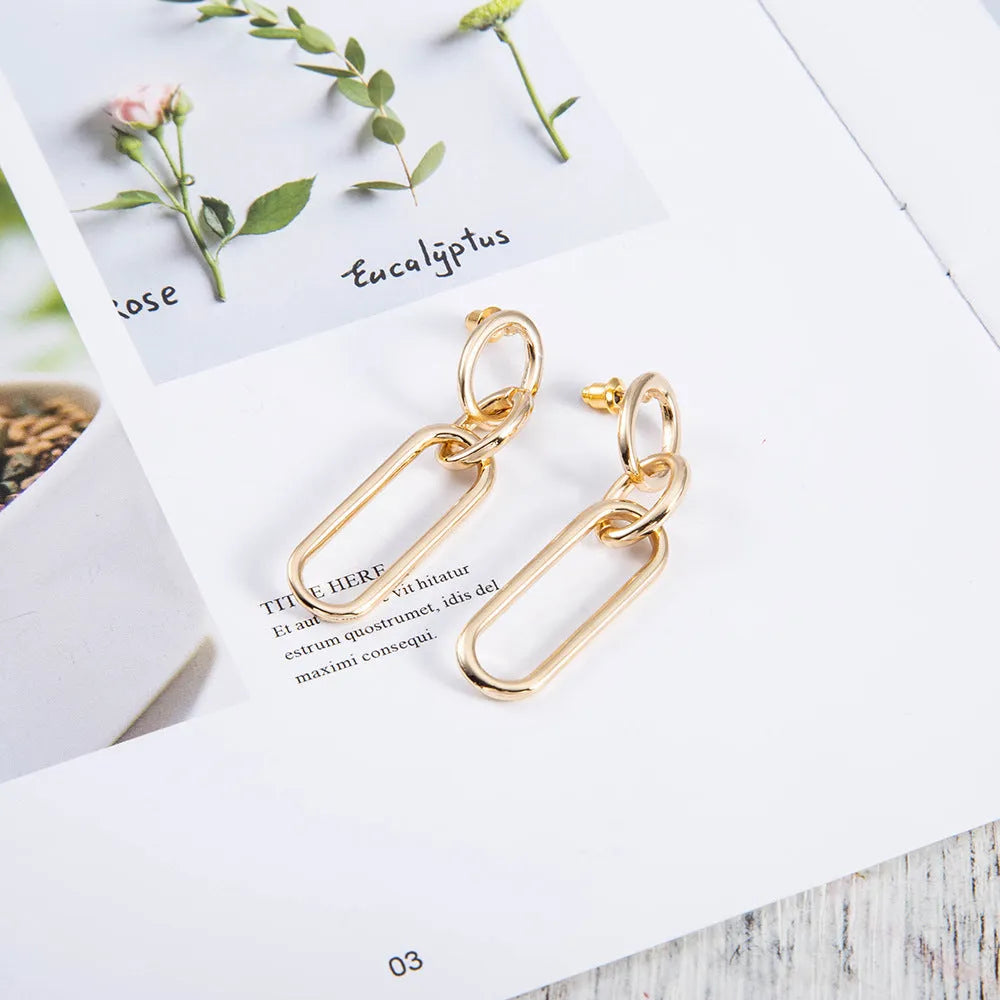 Geometric sterling silver needle colour hoop earrings with ring and line design