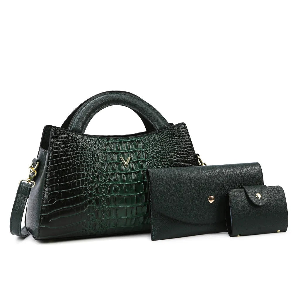 Women's black crocodile pattern PU leather crossbody handbag showing square shape and single shoulder strap.