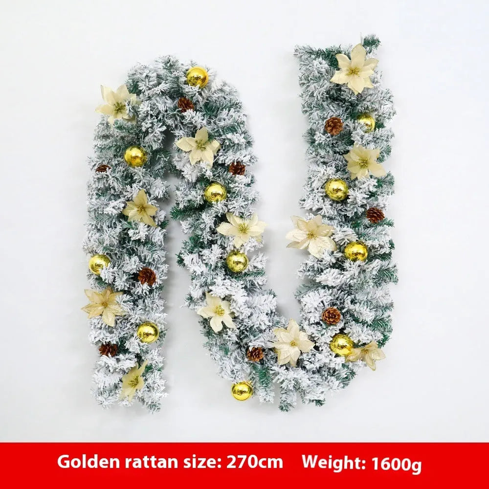 PVC rattan Christmas garland with flocked decoration in golden colour, draped along a mantle