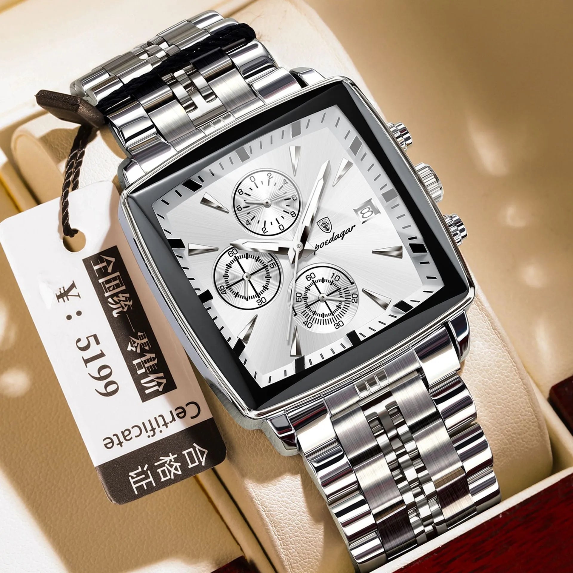 Square men's business watch with alloy case and stainless steel bracelet on wrist.