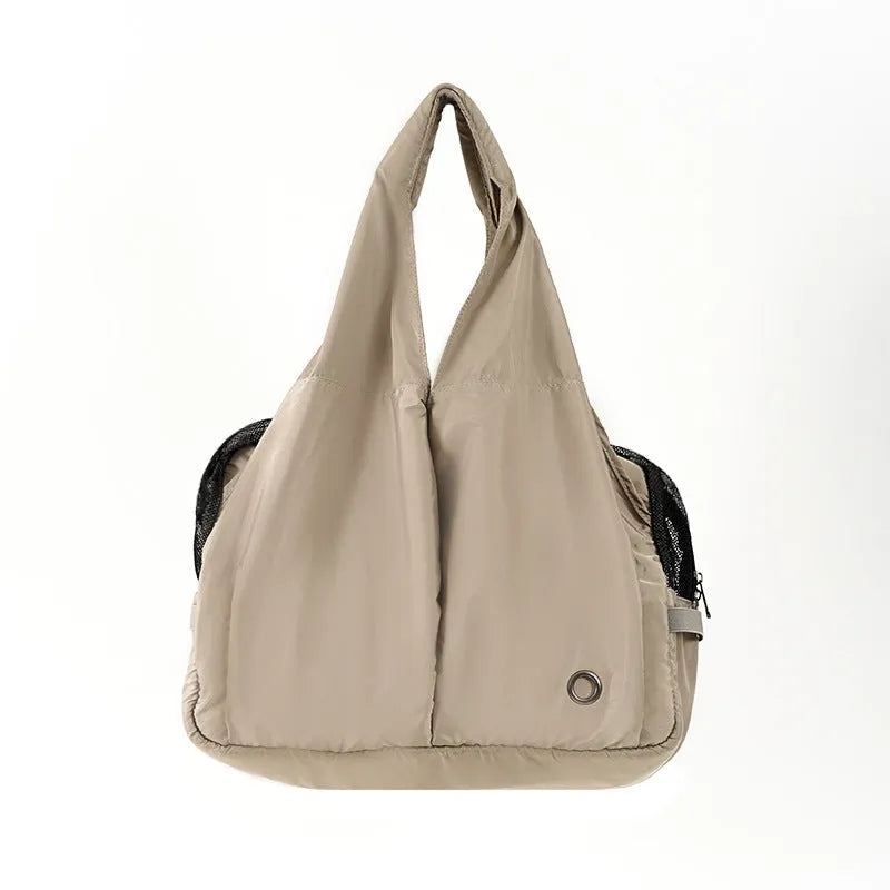 Apricot cloth pet carrier handbag with breathable construction for summer outdoor transport