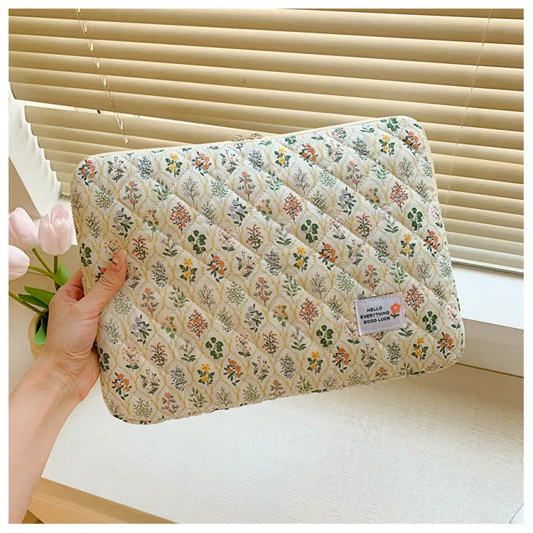 Little flower printed laptop bag in breathable cloth with anti-seismic protection shown in green floral pattern