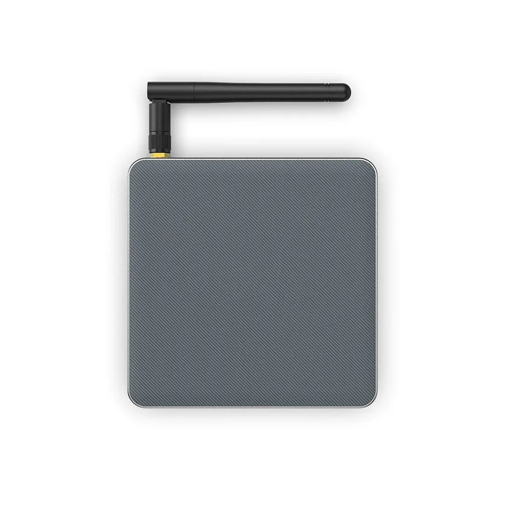 Android TV set-top box with remote control, HDMI cable, and power supply on a white background