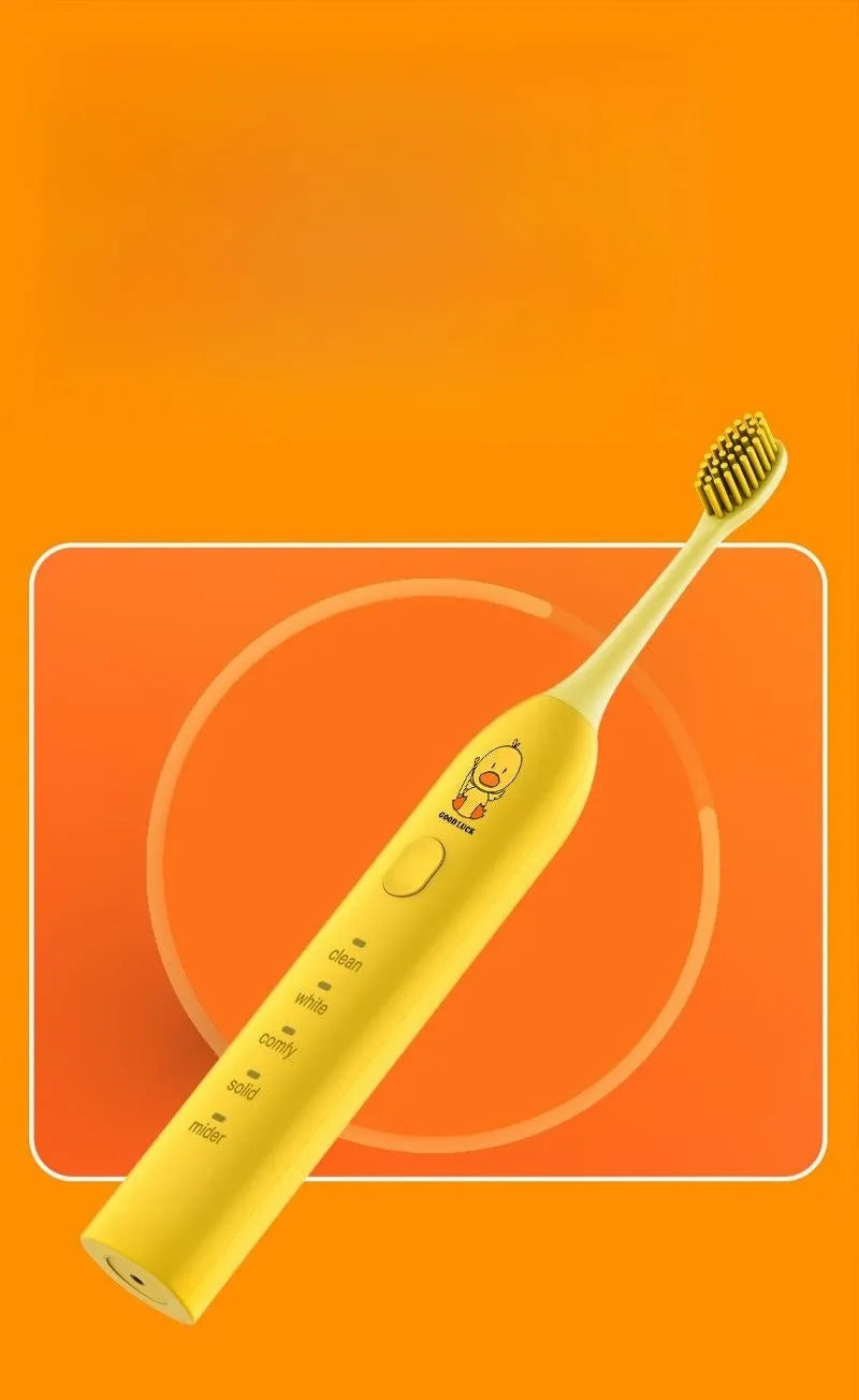 USB rechargeable electric toothbrush in yellow with small duck design and soft bristle head