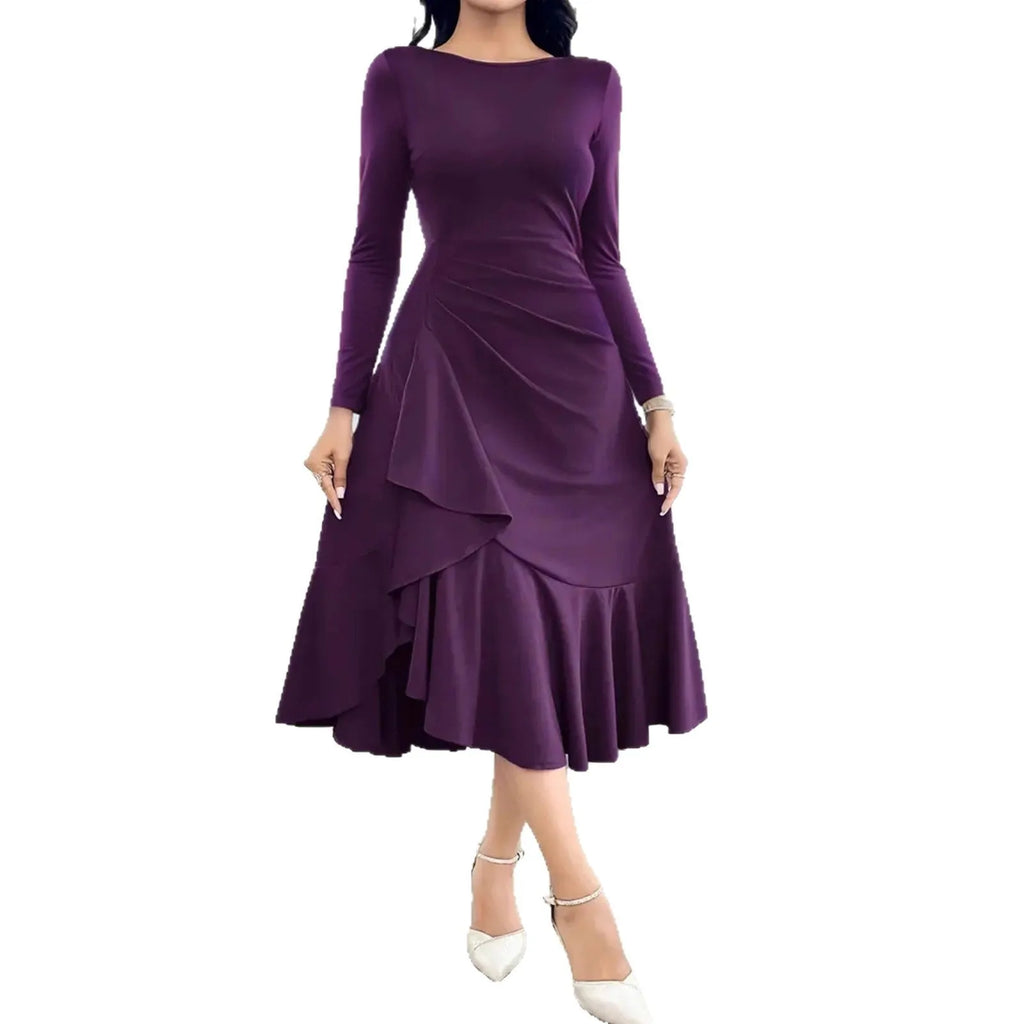 Purple women's long sleeve pullover dress with round neck and ruffle detail on a hanger.