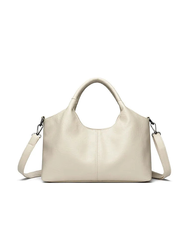 Genuine leather women's cross-body bag in seven colour options with soft texture and large capacity