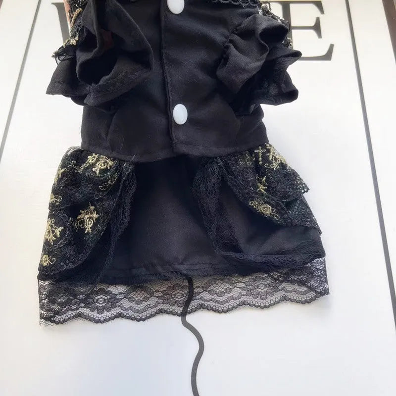 Golden Gothic princess skirt costume for a small dog on a mannequin.