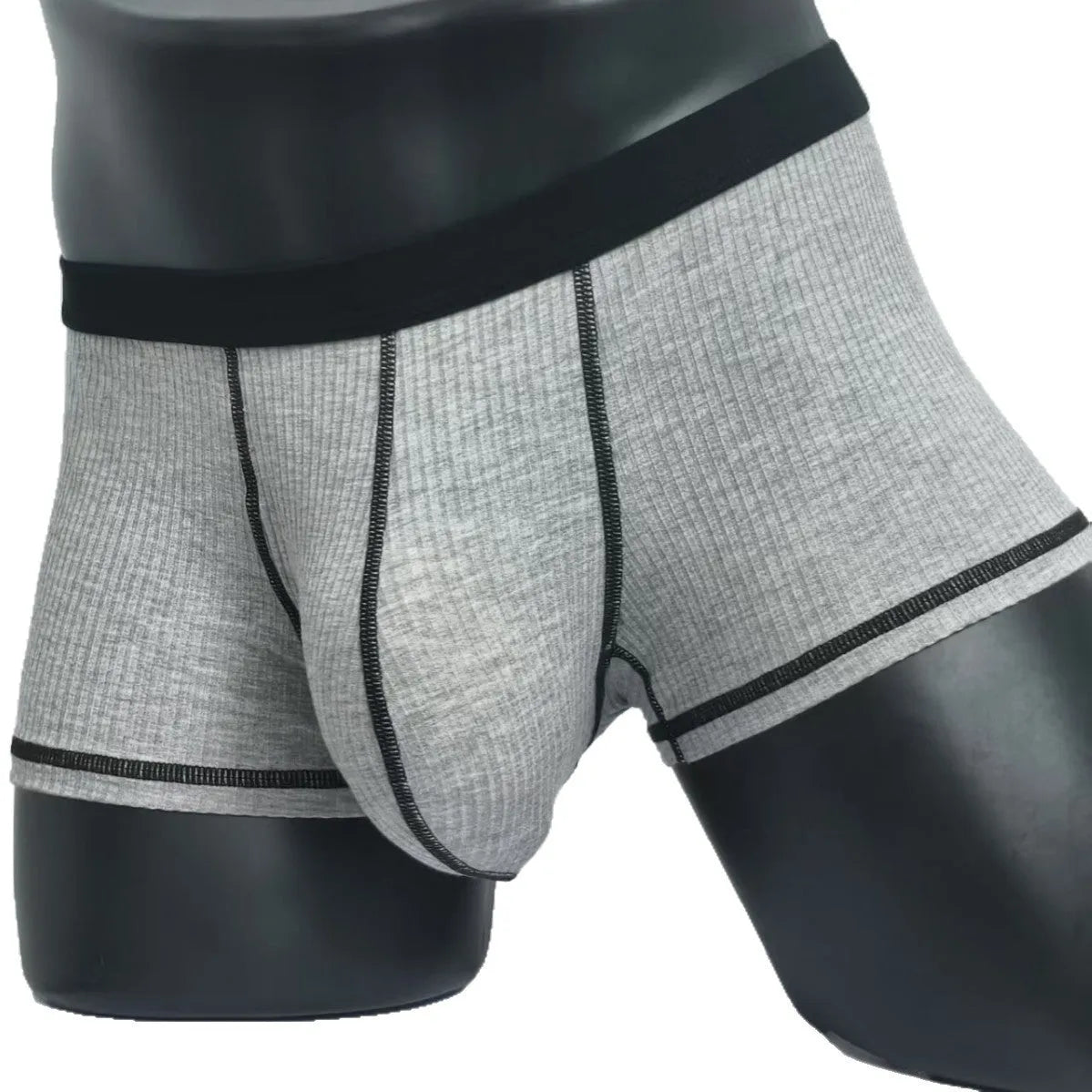 Solid colour men's boxer shorts in breathable fibre fabric, shown in Army Green.