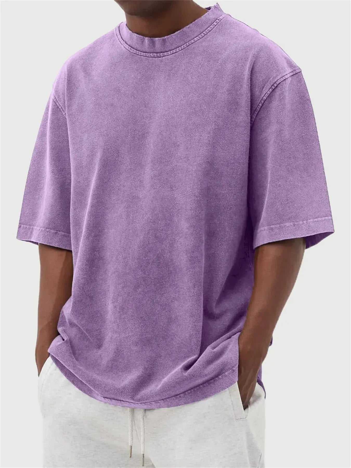 Men's distressed stone wash pullover T-shirt in loose fit with half sleeves available in multiple solid colours