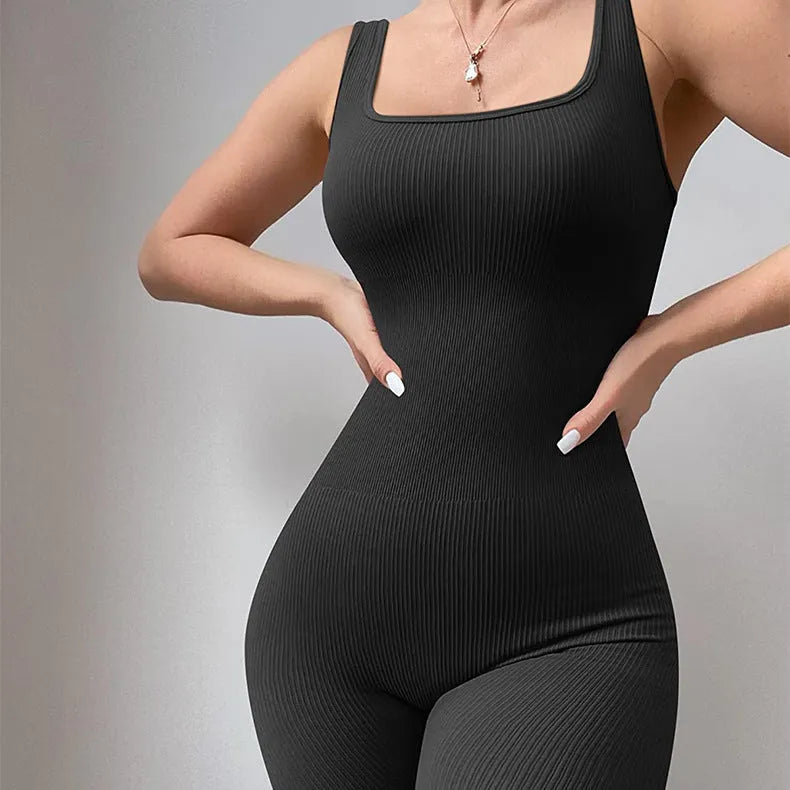 Women's beige suspender tank top tights with button detailing and long sleeves made from spandex fabric.