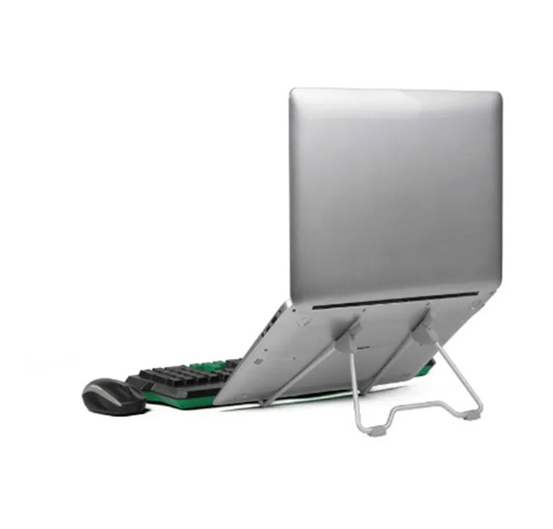 Grey adjustable aluminium and plastic stand holding a mobile phone and a laptop.