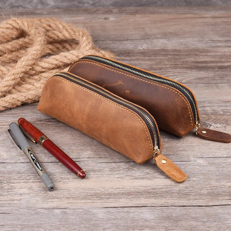 Handmade square leather pencil and glasses case with zipper, shown in black colour.