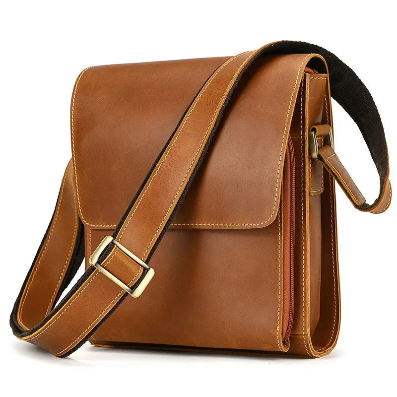 Brown men's leather crossbody shoulder bag with visible stitching and a long strap.