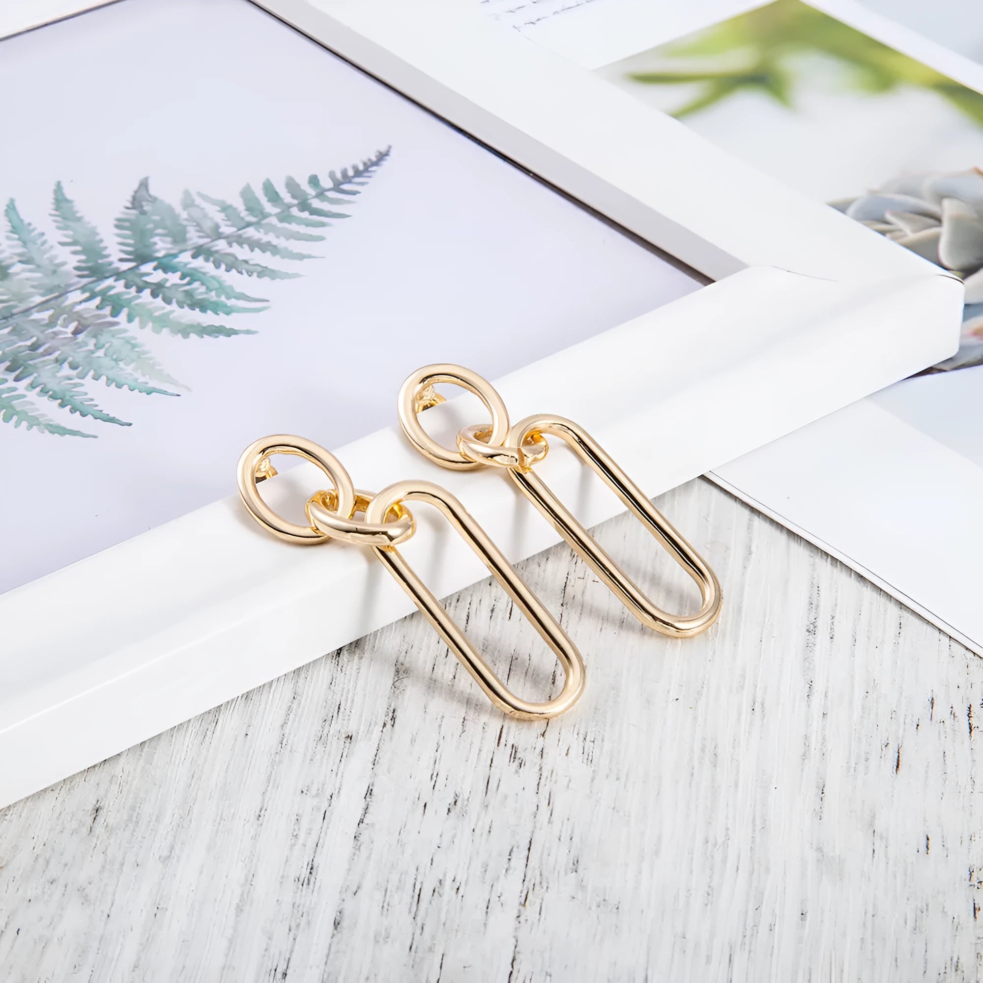 Geometric sterling silver needle colour hoop earrings with ring and line design