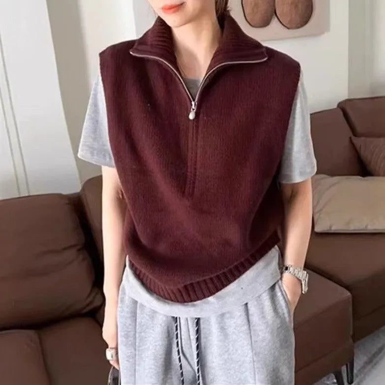 Retro half-zip sleeveless knit vest in mesh polyester fabric shown in a solid colour