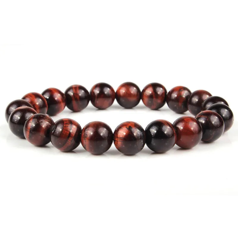 Natural tigereye crystal bracelet with geometric round beads showing colour and size options.