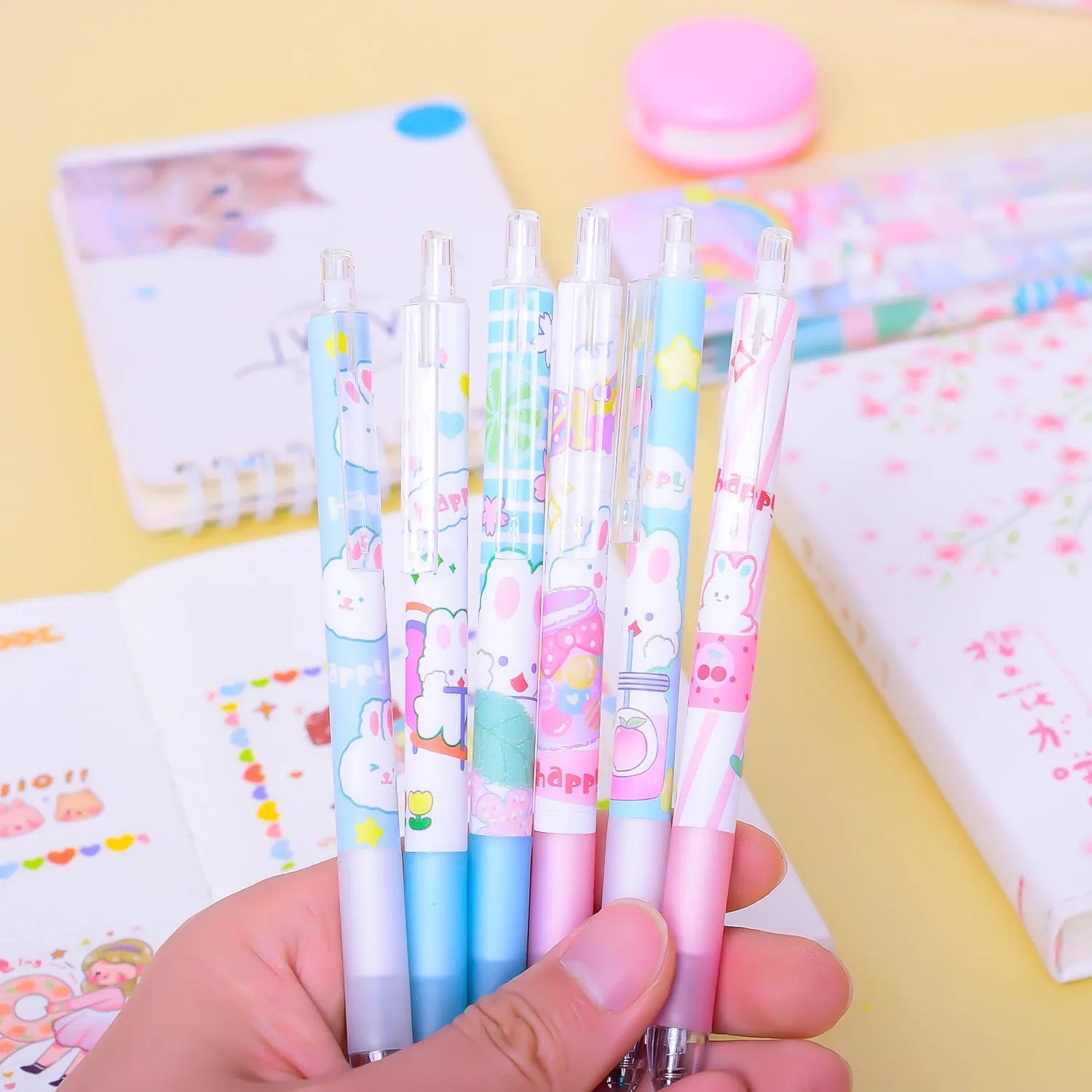 Six black signature pens with cartoon bunny designs and 0.5mm fine tips for writing