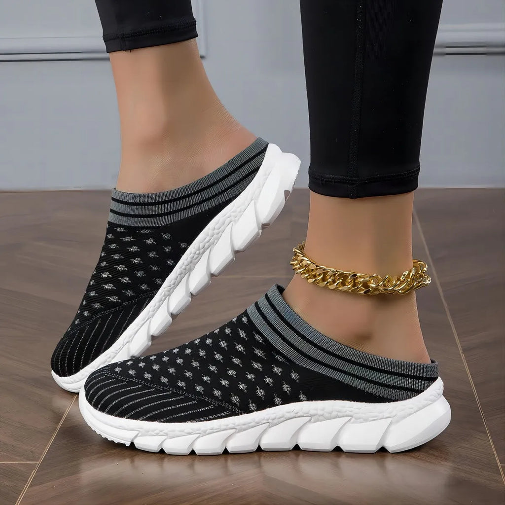 Women's striped Flyknit slipper shoes in black, pink, or purple with hollowed-out sewing line details
