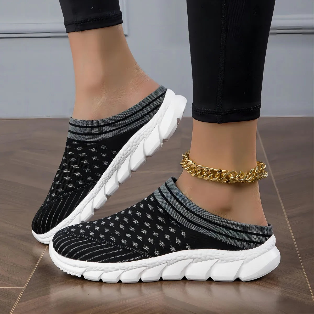 Women's striped Flyknit slipper shoes in black, pink, or purple with hollowed-out sewing line details