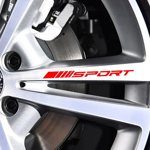 Hollow pattern sports design car rim stickers in black, red, and white colours