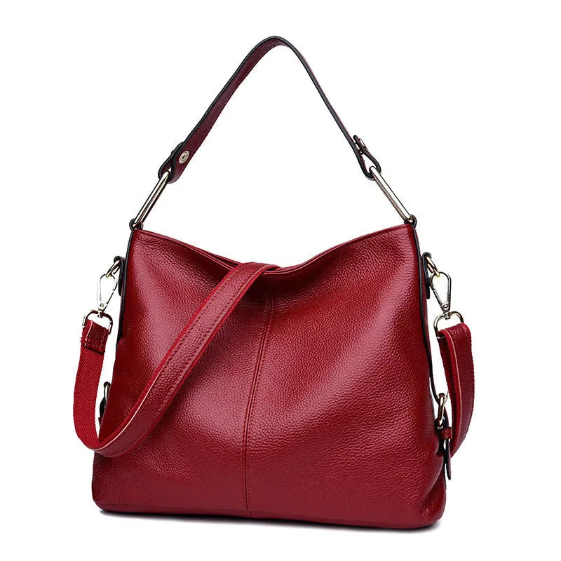 Genuine leather crossbody bag in vertical square shape with internal phone and document compartments