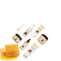 Seven-piece skincare set showing facial cleanser, face cream, lipstick, protective cream, body lotion, facial scrub and beef tallow soap