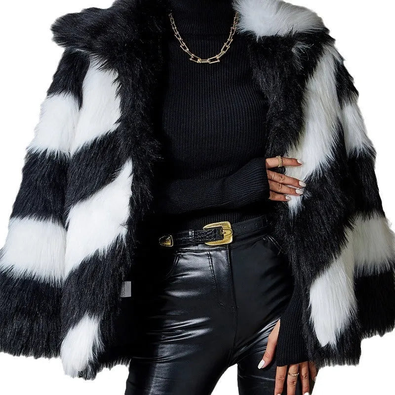 Women's faux fur coat with contrast lapel and fur collar in mid-length design